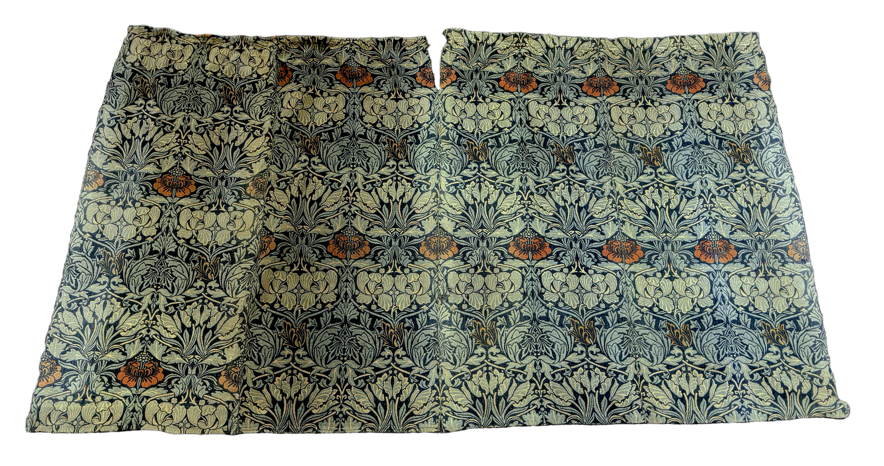 William Morris (1834-1896). Four panels of ‘Tulip and Rose’ triple woven wool and linen mix being two lengths sewn together creating a pair of wider curtains widest curtain (of two panels) 189cm wide x 158cm long, Single